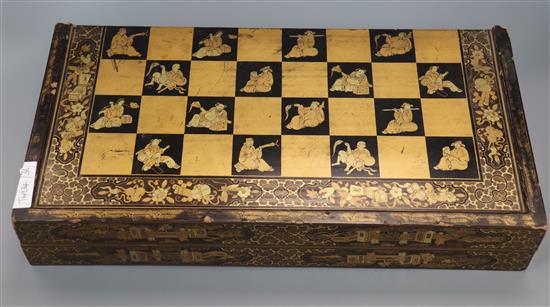 An Oriental lacquered chess/backgammon board